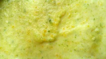 Soup of mashed green zucchini with milk. Vegetarian meals.