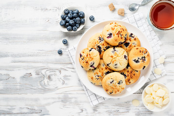 Blueberry Muffin Cookies on white wooden background.