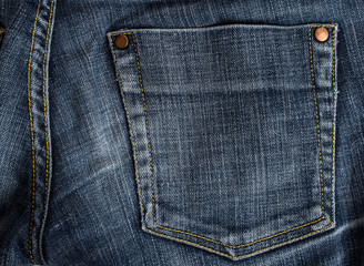 blue denim texture with a pocket details