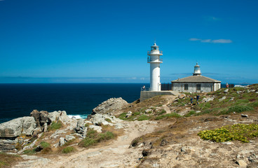 Fototapeta na wymiar Sunny day in cape Touriñan lighthouse in La Coruña, Galicia