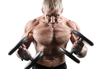 Muscular adult brutal man with dumbbells pumping biceps isolated on white background. Portrait of...