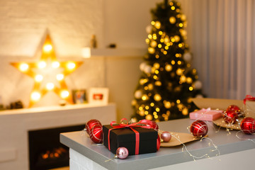 Christmas gift box. Christmas presents in boxes at white wooden table.