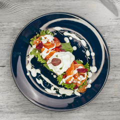 Egg benedict with smoked salmon on toast. Delicious breakfast