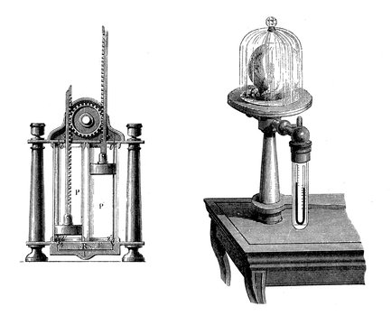 Vintage air pump with working sections compressing air. A double-barrelled air pump was used primarily for scientific research to create vacuum