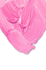 Pink Lipstick smudge isolated on white. Top view, flat lay.