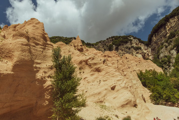 Fototapeta premium Italy, August 2020 - Panoramic view of the Canyon of the Lame Rosse near Lake Fiastra in the Marche Region