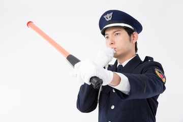 交通誘導をするガードマン