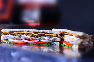 Fresh and juicy Sandwich, cheese, tomatoes, lettuce, and toasted bread yummy food 