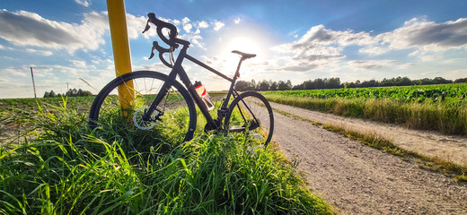 Gravel bike during sunset. Outdoor sport activity. Healthy and easy sport