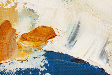 The texture of the canvas, coated with oil paints. Trendy blue and golden colors, copy space. The concept of a creative atmosphere, artistic events, education, etc.