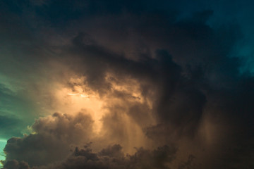 Fototapeta na wymiar Dark sky on a rainy afternoon, lightning and clouds severe weather disturbance, thunder cell