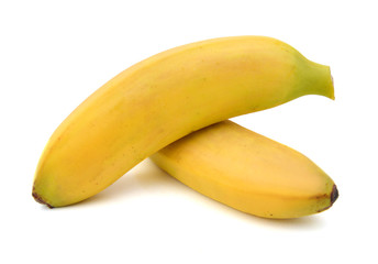 a couple of mini bananas on white background