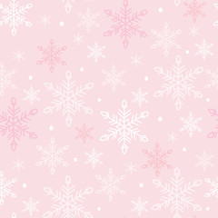 Snowflakes seamless pattern. White snow crystals on light pink background. Great for winter fabric, textile, Christmas wrapping paper, scrapbooking. Surface pattern vector design.