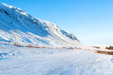 Iceland's incredible mountain landscape in winter. Mountains in the snow. Large spaces. The beauty of winter nature