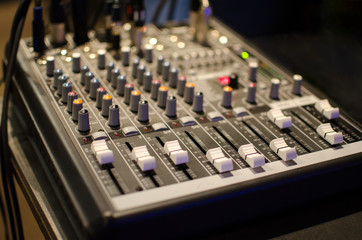 Closeup of portable audio mixing console.