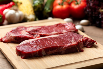 Food, meat and vegetables background. steak, fresh raw beef, background.
