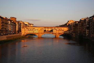 Fototapeta premium View of Ponte Vecchio bridge during sunset in Florence, Tuscany, Italy