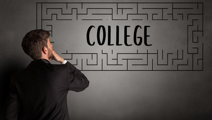 businessman drawing maze with COLLEGE inscription, business education concept