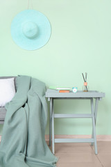 Interior of room with stylish mint wall