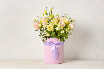 Bouquet of beautiful flowers on light background