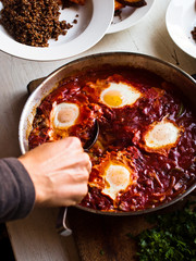 Tomato based Shakshuka - Middle Eastern food in the pan.