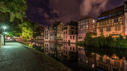 The water Reflection at night in the little France in Strasbourg in France