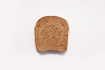 Assortment of baked bread on white background