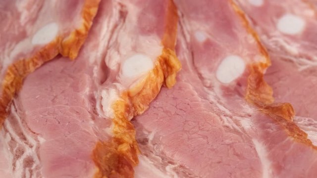 smoked sliced ham close up rotating