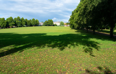 Elegant Quarry Park in the beautiful historic English city of Shrewsbury. Trees line lush green lawns making a pretty scene on a summers day.