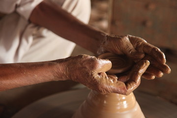 Potter man, clay molding, shaping clay molding potter, potter hand clay mold