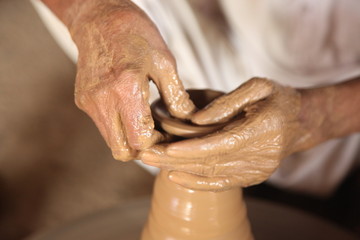 Fototapeta premium hands of old potter