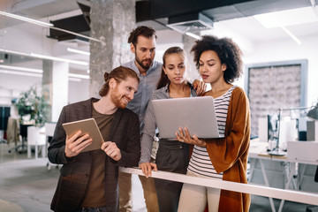 Group of people in a business meeting discussing ideas in office