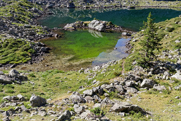 A small green lake among the rocks