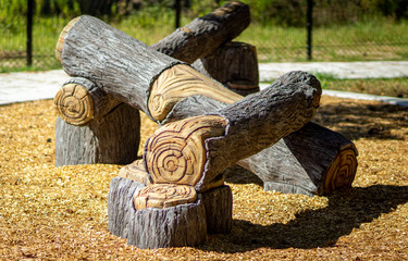 faux logs set up on a playground at a public park in Conroe, TX.