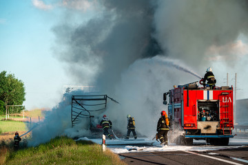 accident and fire on the road vertically