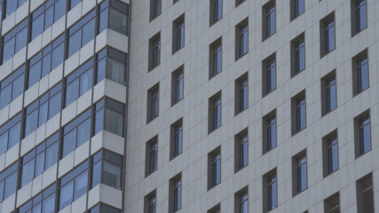 Generic day time establishing exterior apartment building in urban city.