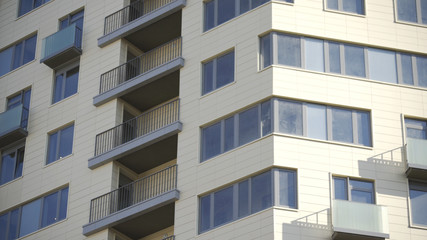 Windows and balconies of Apartment building in new residential sleeping area in Moscow