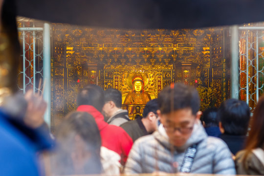 Lungshan Temple of Manka in Taipei, Taiwan with unrecognisable worshipers 