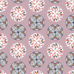 Seamless vector pattern of ornamental lined abstract flower snowflakes on pink