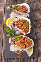 oyster with cheesy gratin