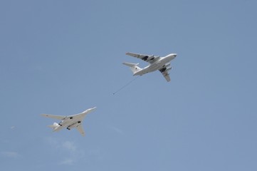 Fototapeta na wymiar Simulated air refueling of Il-78 and Tu-160 aircraft in the sky over Moscow during the dress rehearsal of the Victory parade