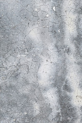 Seamless gray concrete wall background texture. Cracked paint texture in black and white.