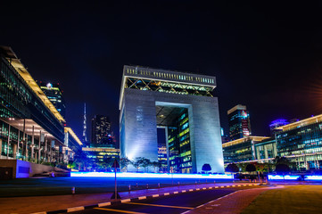 Naklejka na ściany i meble DUBAI -MAY 11:The Gate - main building of Dubai International Financial center, the fastest growing international financial center in Middle East. 11 May 2016 , Dubai, UAE.