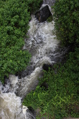 VIEW OF A RIVER AND WATERFALL