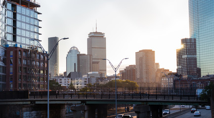 Scenic background of downtown Boston during a glorious sunset, showing skyscrapers and the...
