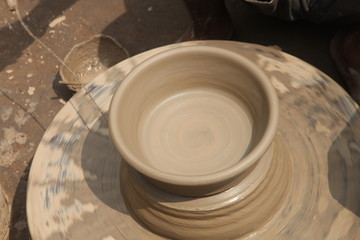 clay potter, clay molding, man plotter