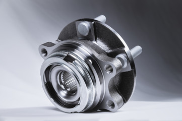 Spare parts new abs front car suspension hub on a gray gradient background assy. Kit for repairing...