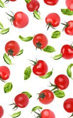 Many whole tomatoes and basil leaves falling on white background