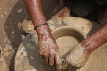 Potter at work, clay molding, man work clay, potter man