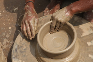 Potter at work, clay molding, man work clay, potter man